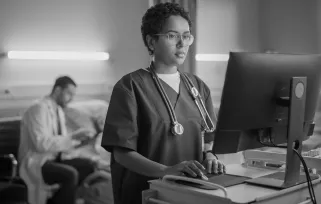 Cardiovascular%20tech On%20computer In%20hospital%20copyB%26W Png