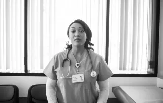 nurse looking at camera