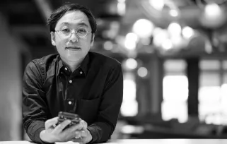 Man In%20glasses Holding%20phone At%20workB%26W Jpg