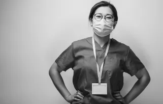 nurse wearing ask and lanyard