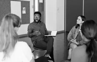 psychologist in group meeting