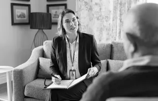 social walker on a house call with elderly man