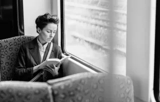 Woman Reading On%20commute Png