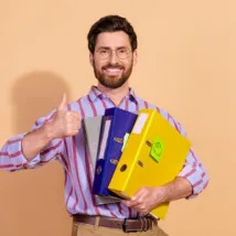 young man holding files consist of claims documents from his customers