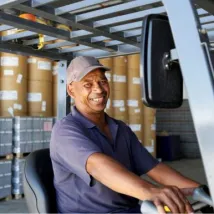 Man driving fork lift truck