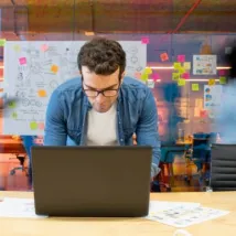 male employee with laptop for seo