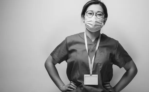 nurse in mask and scrubs